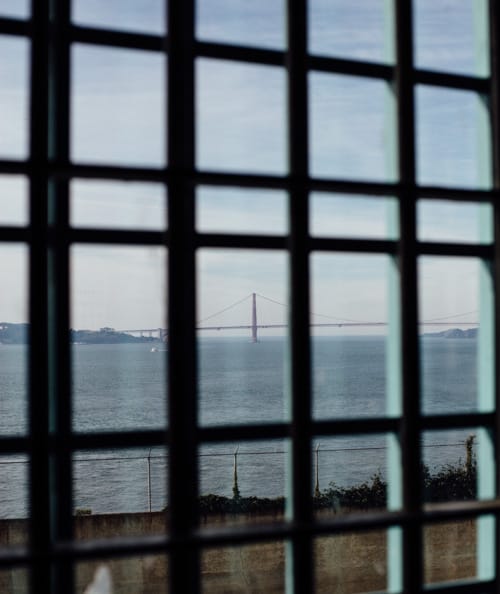 golden gate bridge through mess hall window alcatraz