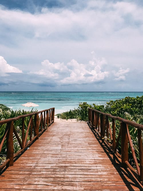 path leading to the beach in riviera maya mexico unico 2087 by the travel palate