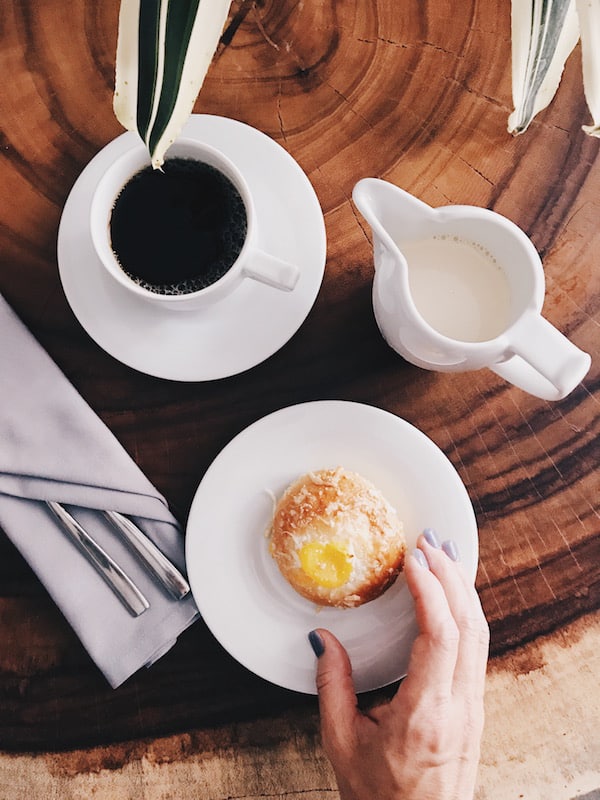 coffee and creamer on wood table