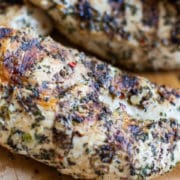 cilantro lime green chile grilled chicken on a cutting board