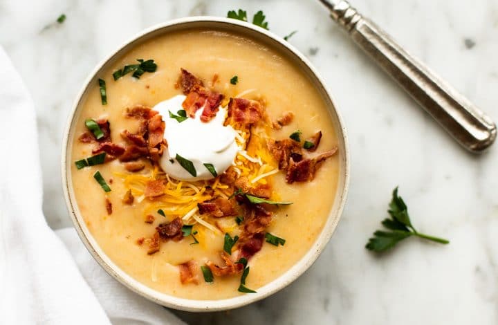 Everyone needs a Creamy Potato Soup Recipe and this one is sure to be a family favorite! Creamy and comforting, this soup doesn’t take long to make but tastes like you spent all day in the kitchen. As soon as the weather turns cool, my family begs for this soup and I’m sure yours will too.