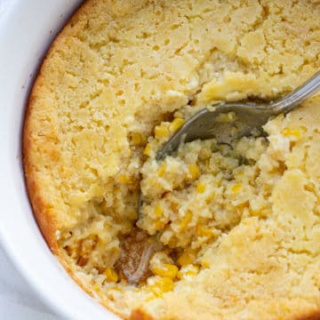 This creamy Corn Casserole is the perfect side dish to accompany your favorite holiday meals. Made with creamed corn, sour cream, and sweet cornbread mix, this recipe is sure to please and is a breeze to make! Only 7 ingredients!