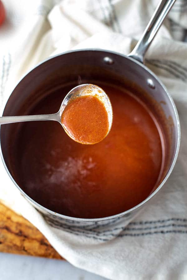 thickened sauce on a ladle 