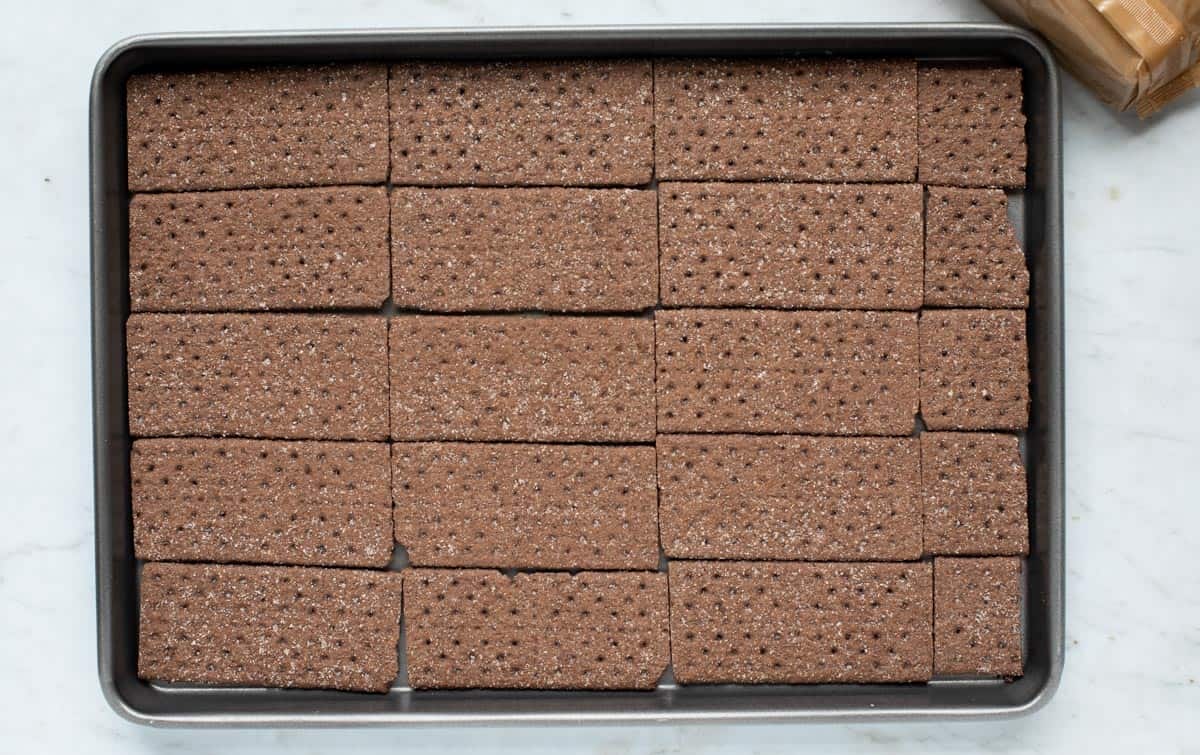 chocolate graham cracker sheets on a cookie sheet