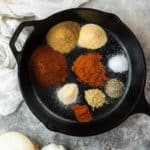 spices in a cast iron skillet