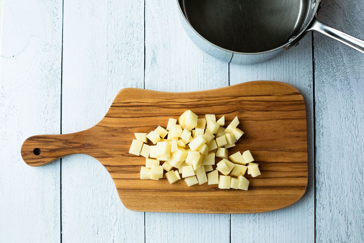 chopped potatoes on a cutting board