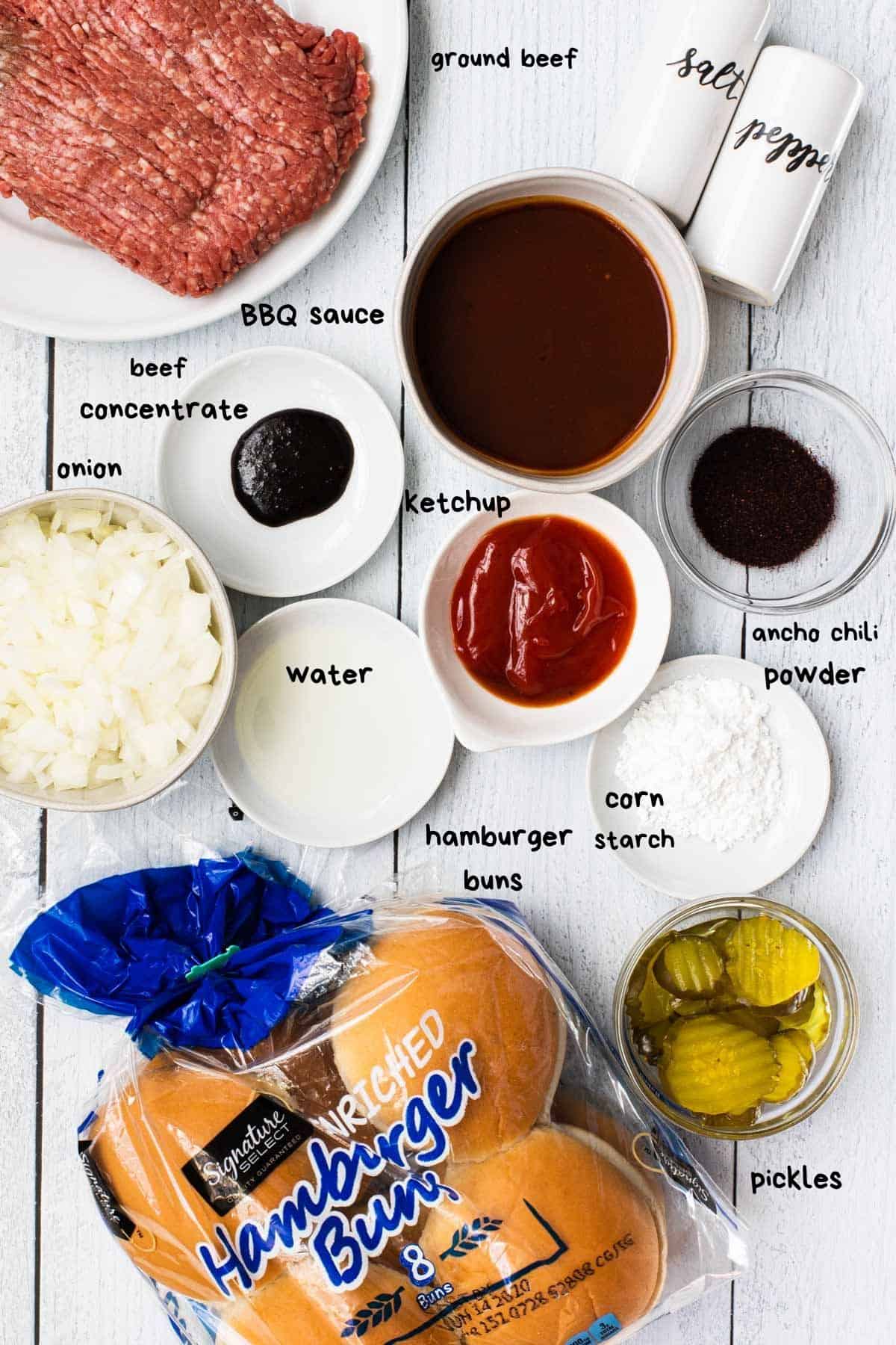 overhead view of ingredients like hanburger buns, ground beef, and bbq sauce