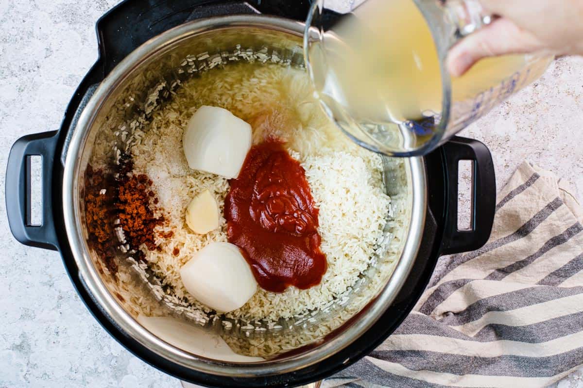 adding broth to instant pot