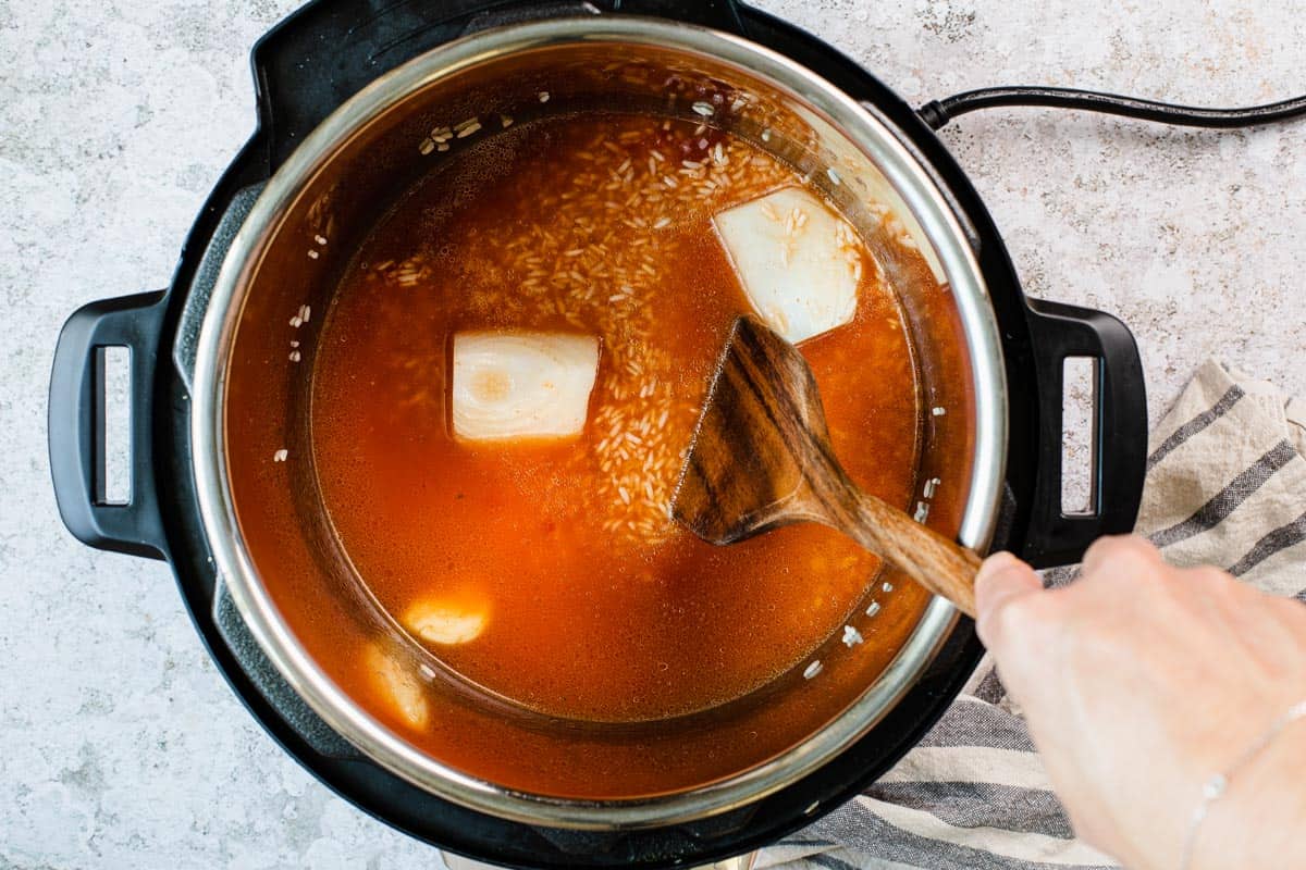 stirring rice mixuture