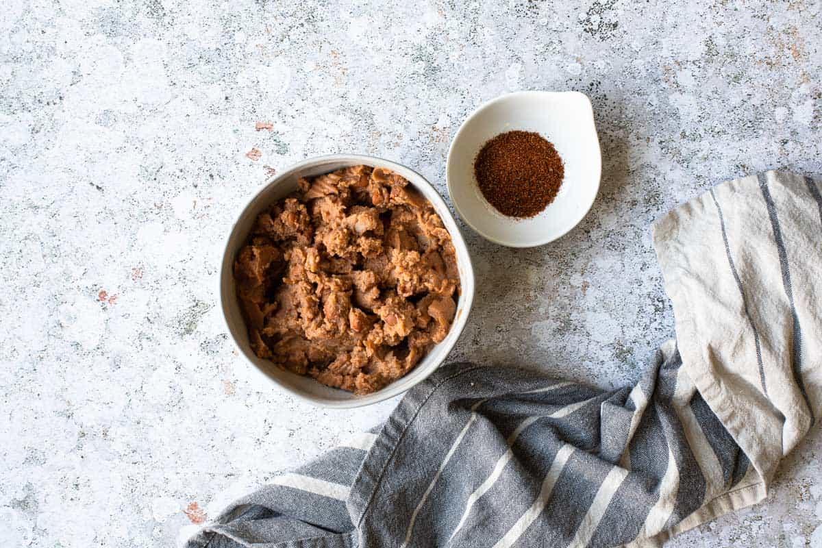 bowl of refried beans and taco seasoning