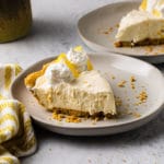 close up of a slice of pie on a white plate