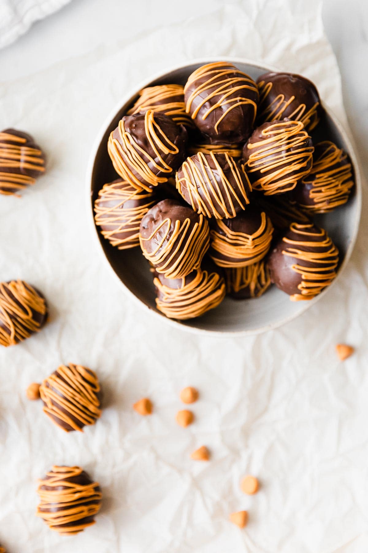 overhead shot of peanut butter truffles in a bowl