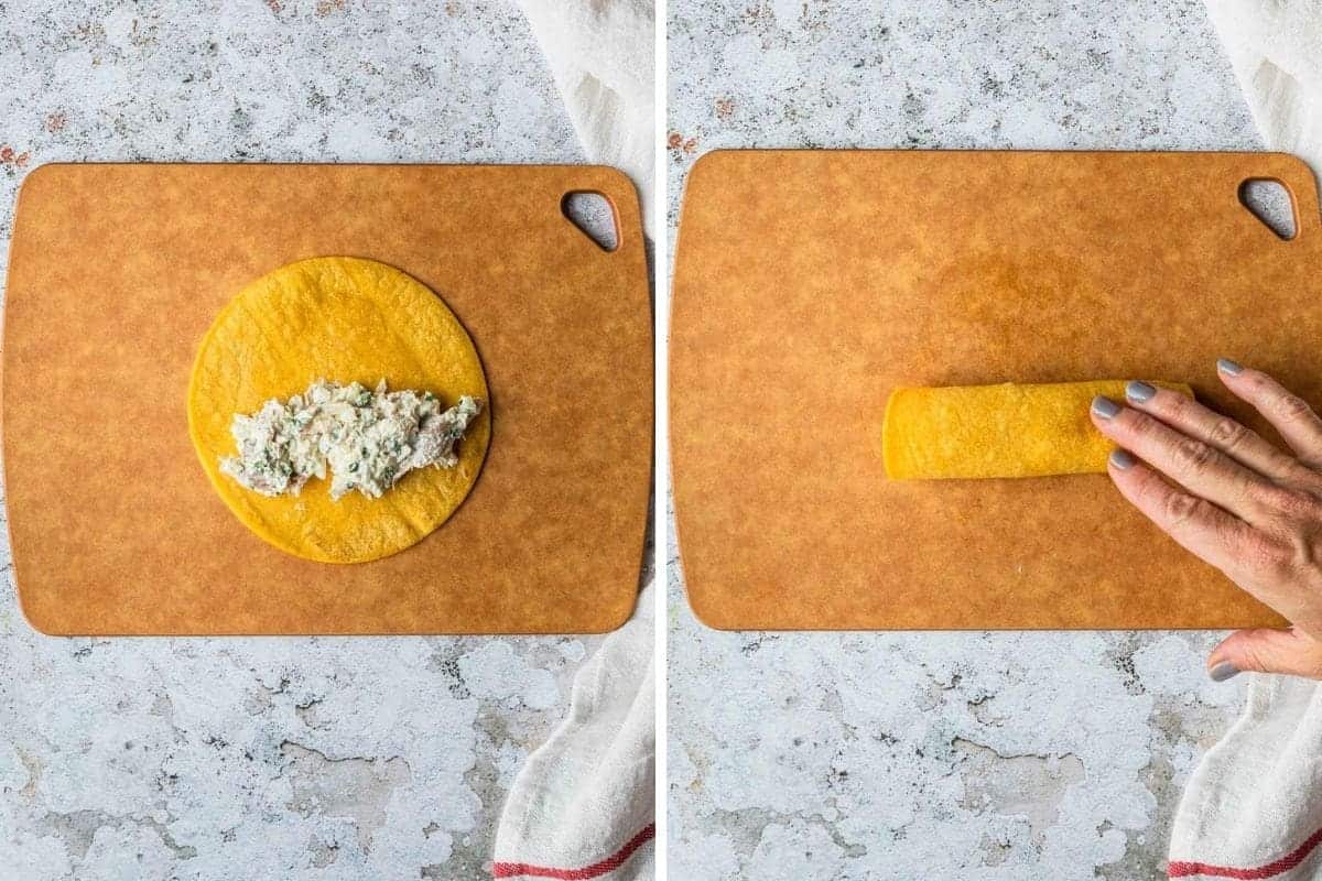 adding filling to a corn tortilla then rolling it up