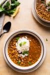 curry lentil soup topped with jasmine rice