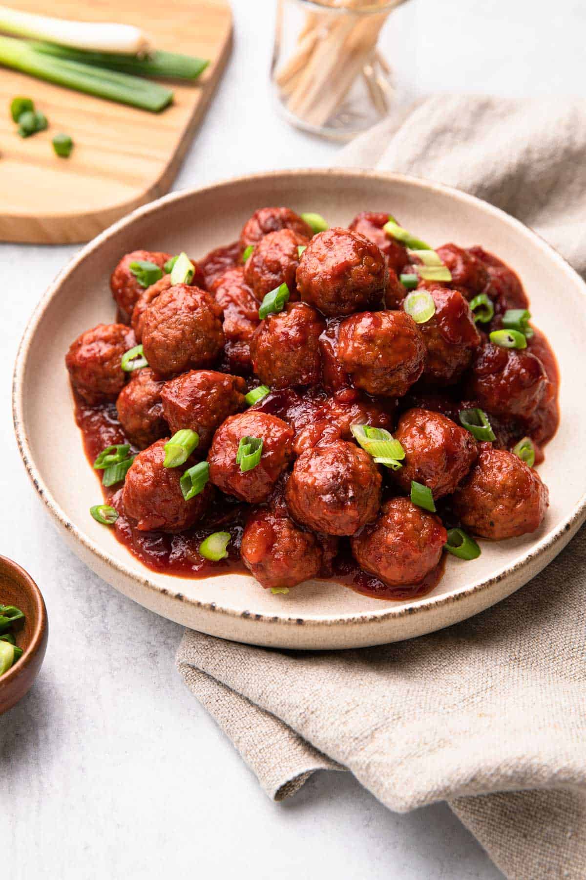 A bowl of cranberry meatballs.