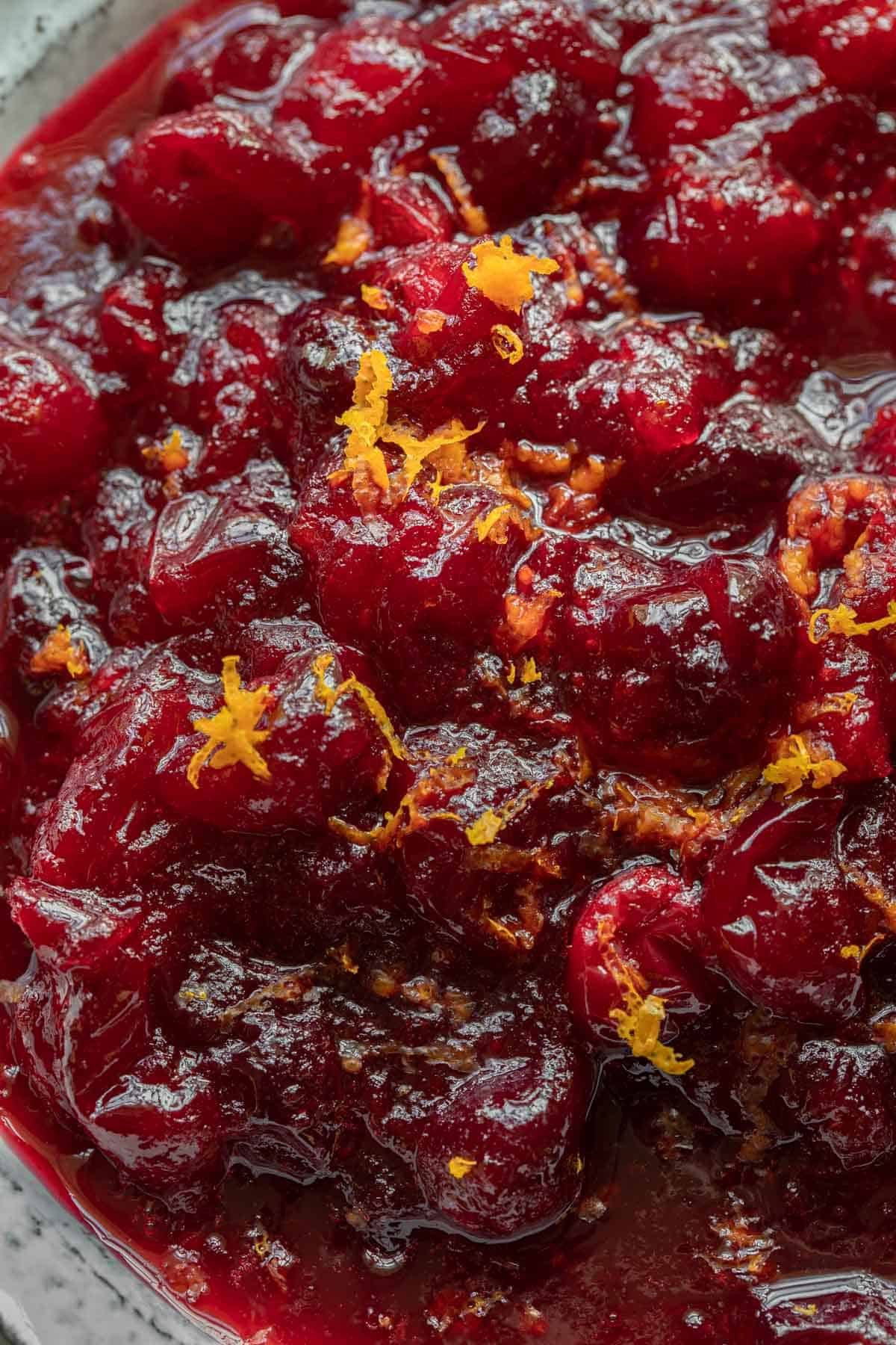 cranberry sauce with orange zest on top.