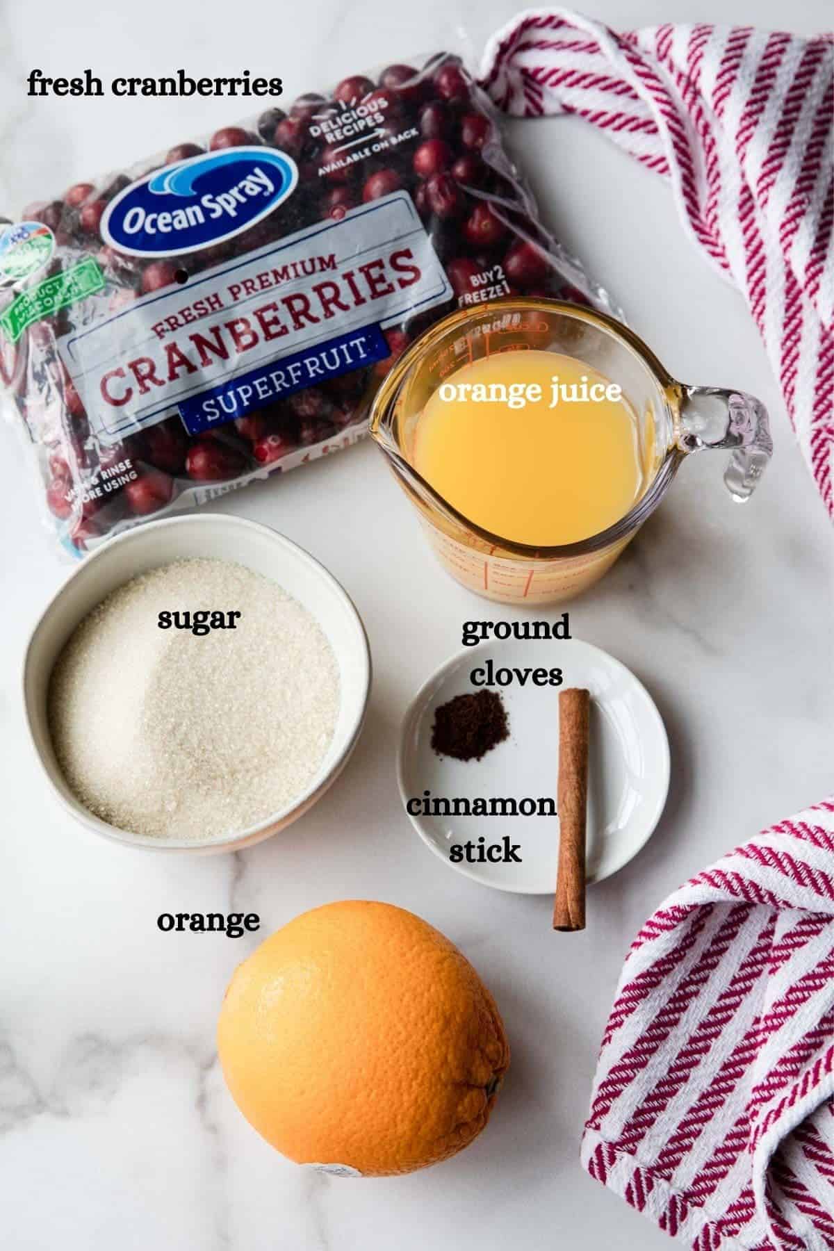 fresh cranberries, sugar, orange juice, ground cloves, cinnamon stick, orange