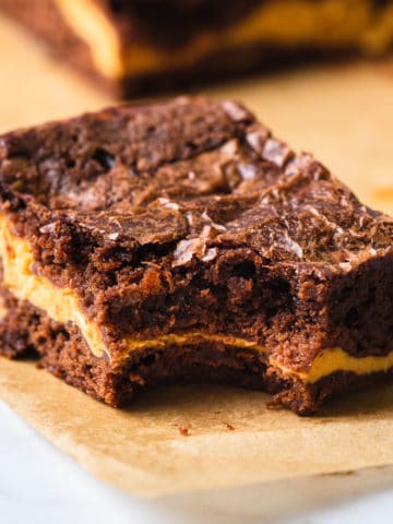 Pumpkin brownie with a bit eaten.