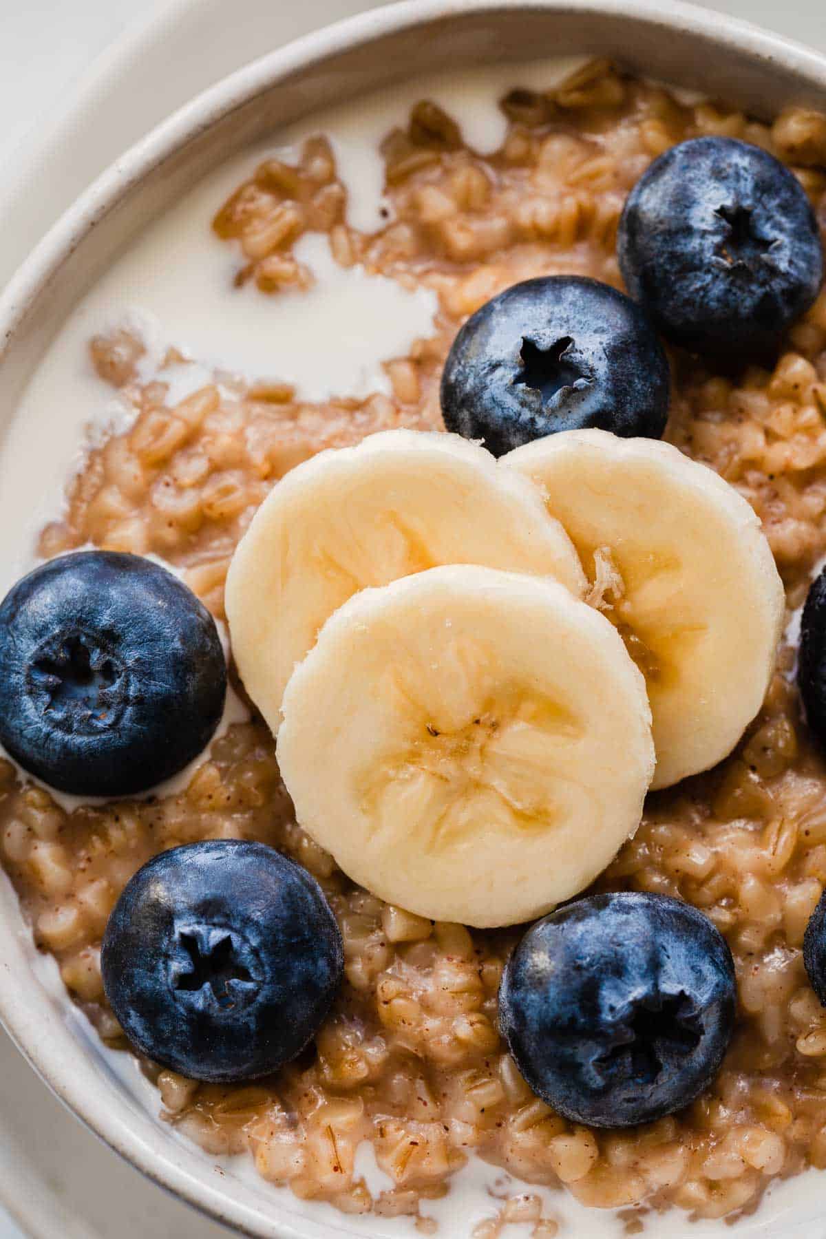 Steel cut oats with banana and blueberries.