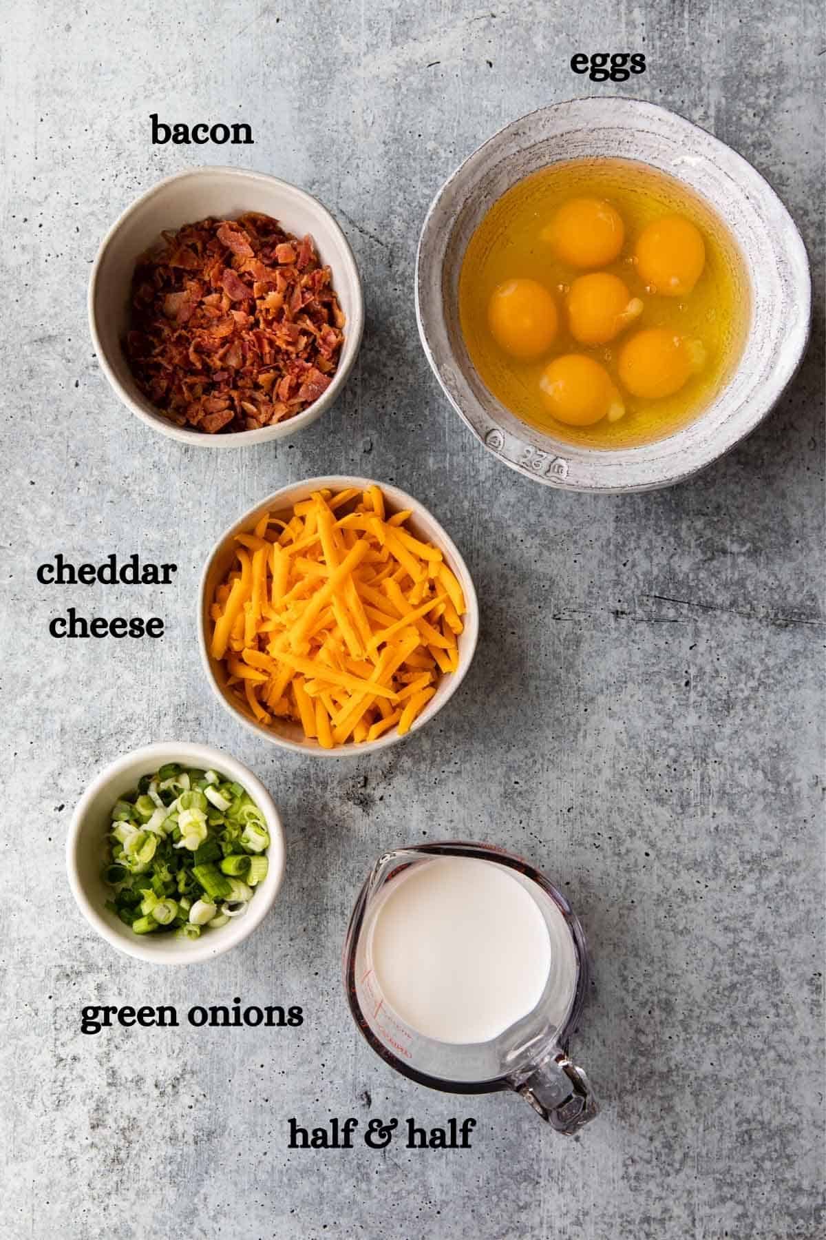 Bacon, raw eggs, cheddar cheese, green onions, half and half