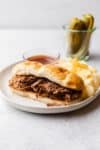 French dip sandwich on a plate.