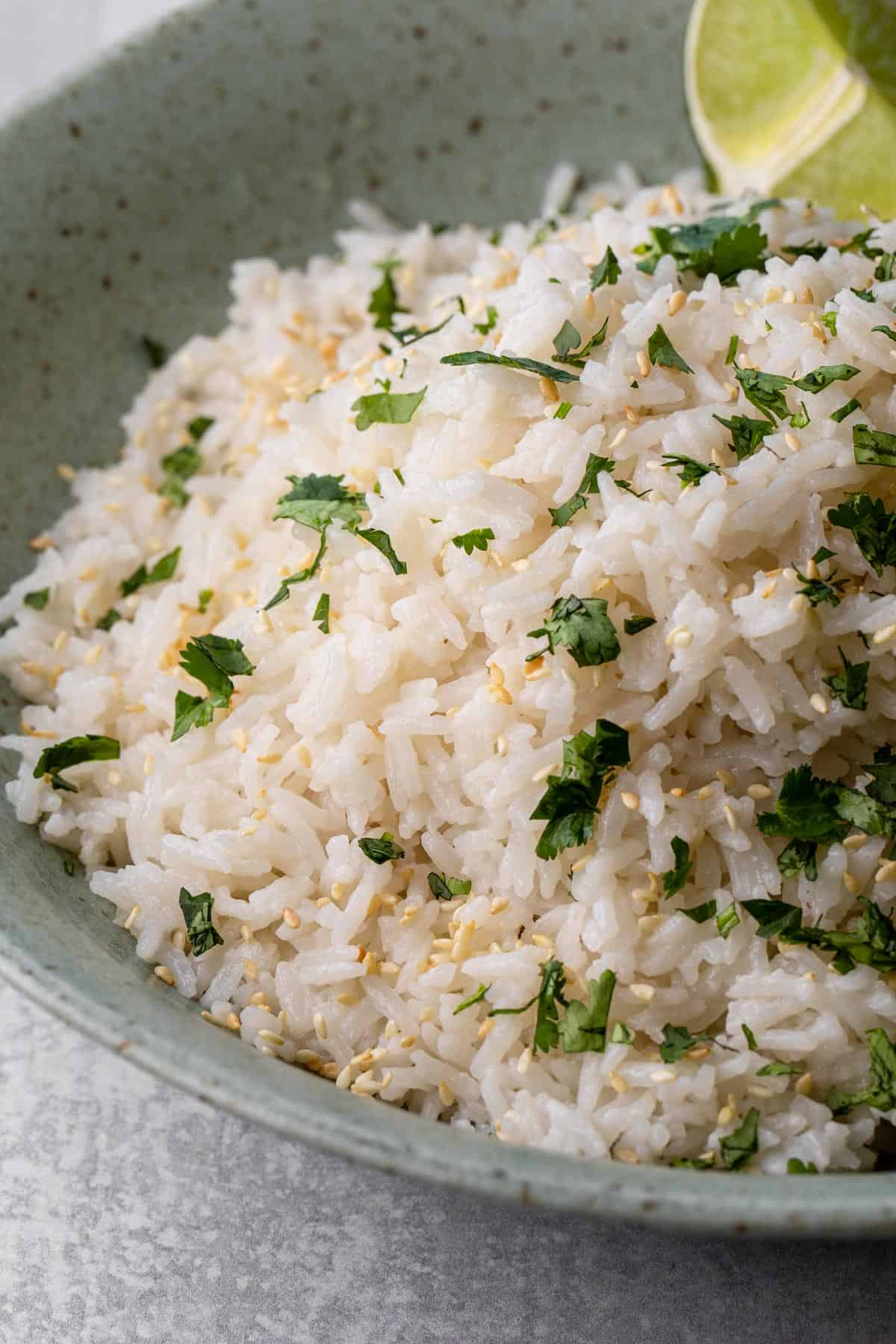 bowl of rice with lime wedge