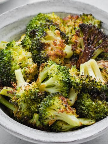 a bowl of roasted broccoli