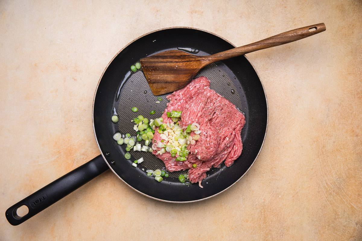 cooking ground turkey and green onions