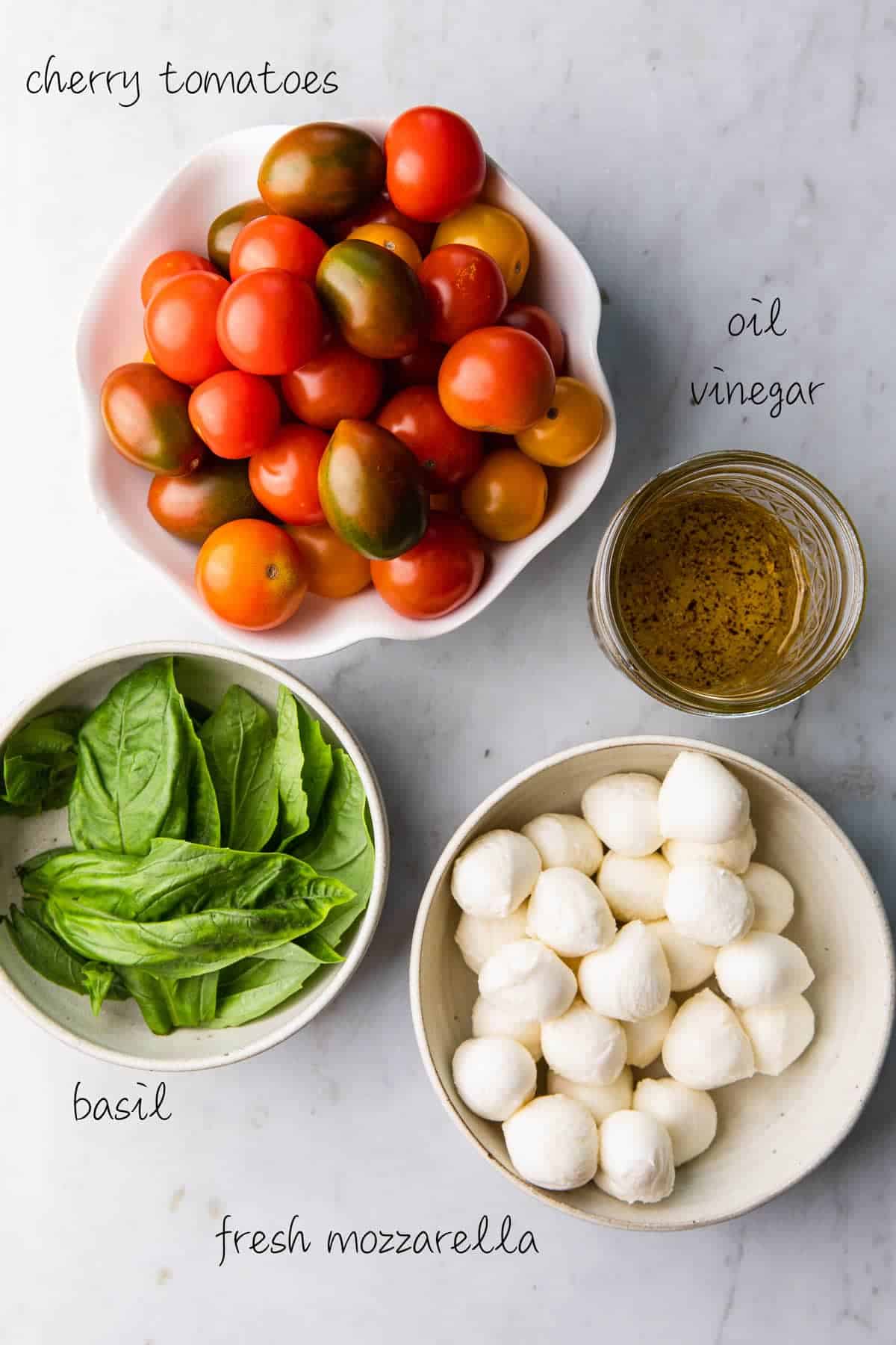 cherry tomatoes, mozzarella balls, olive oil dressing