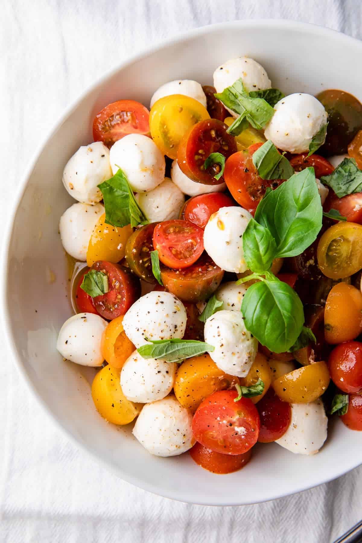 caprese salad in a white bowl