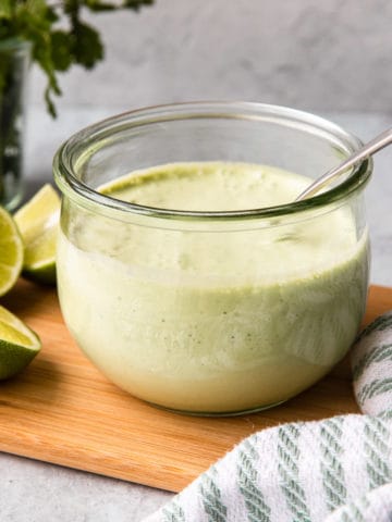 cilantro garlic sauce in a glass container