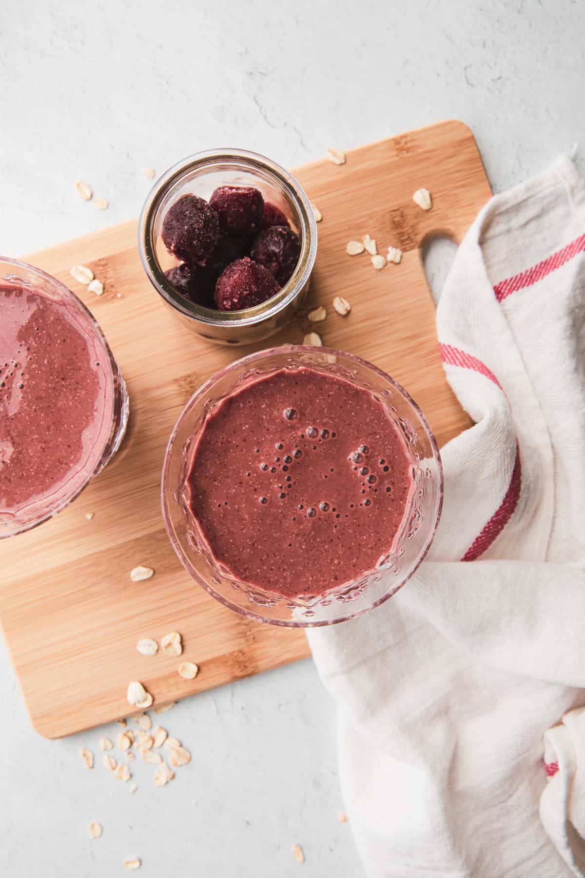 chocolate cherry smoothie on a cutting board