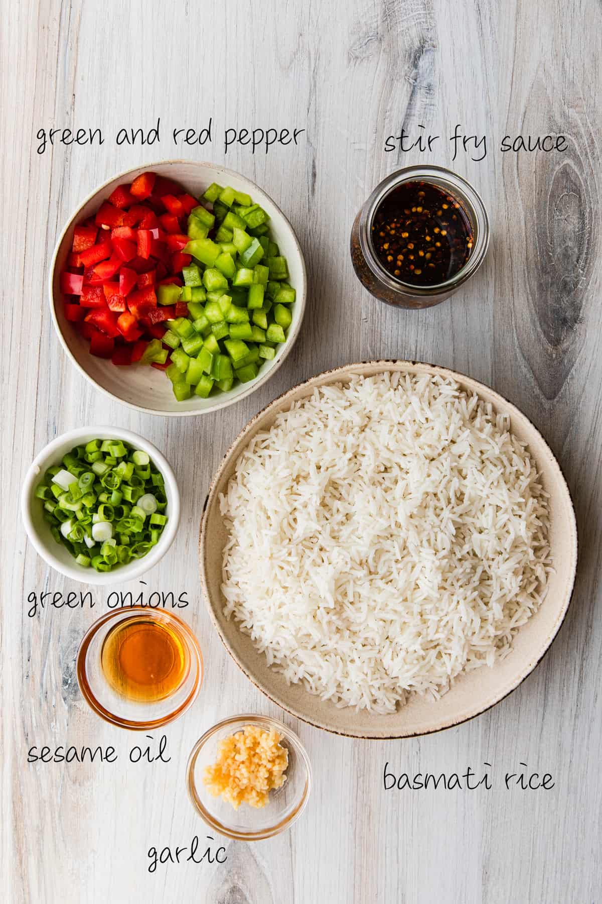 rice, green and red peppers, green onions, sesame oil, garlic, spices