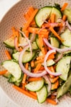 Salad mixed in a bowl.