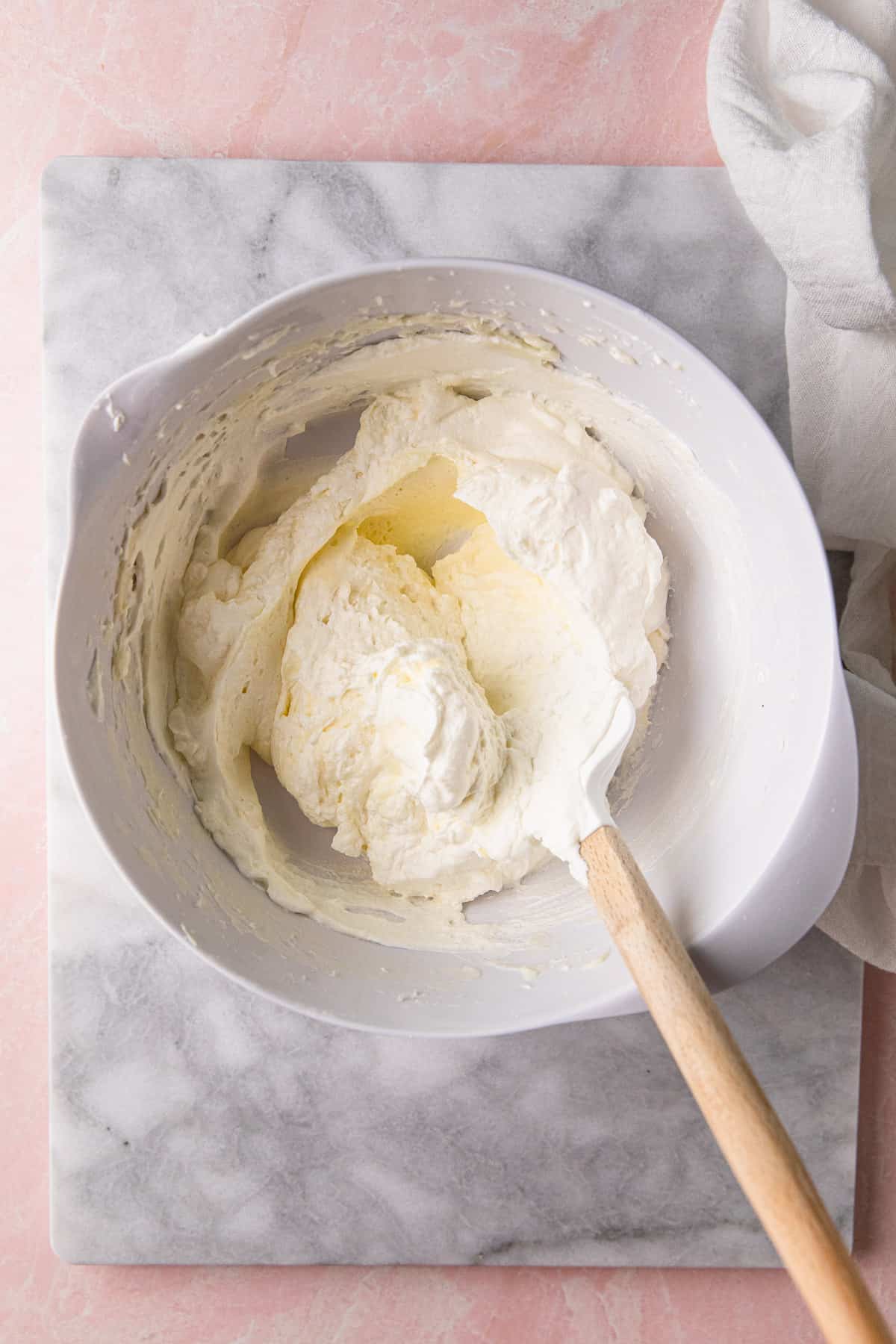 Whipped cream in a bowl.