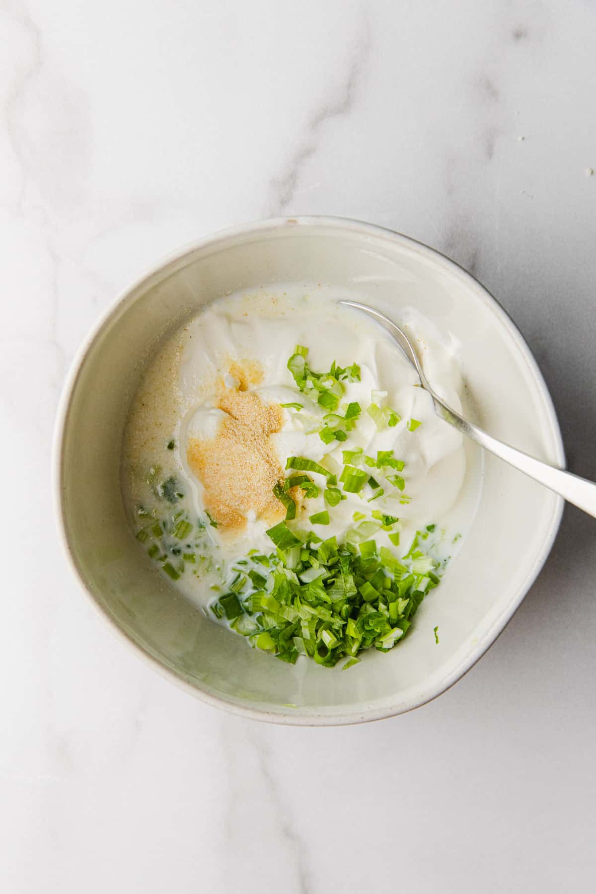 making a dip with sour cream