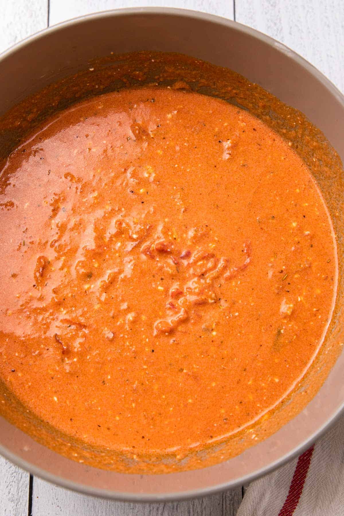 a bowl of of red sauce