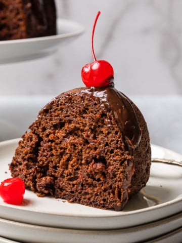 chocolate cherry bundt cake slice on a plate