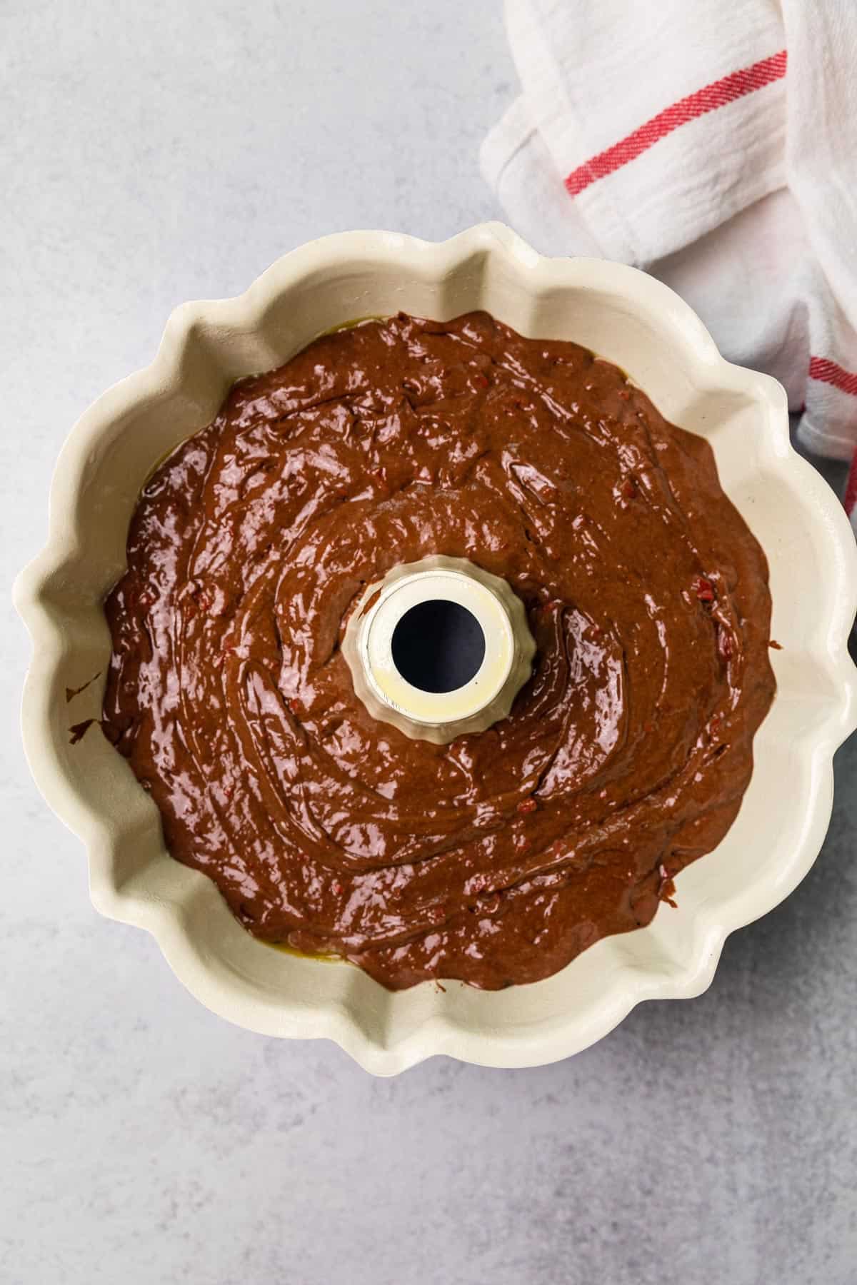 unbaked cake batter in pan