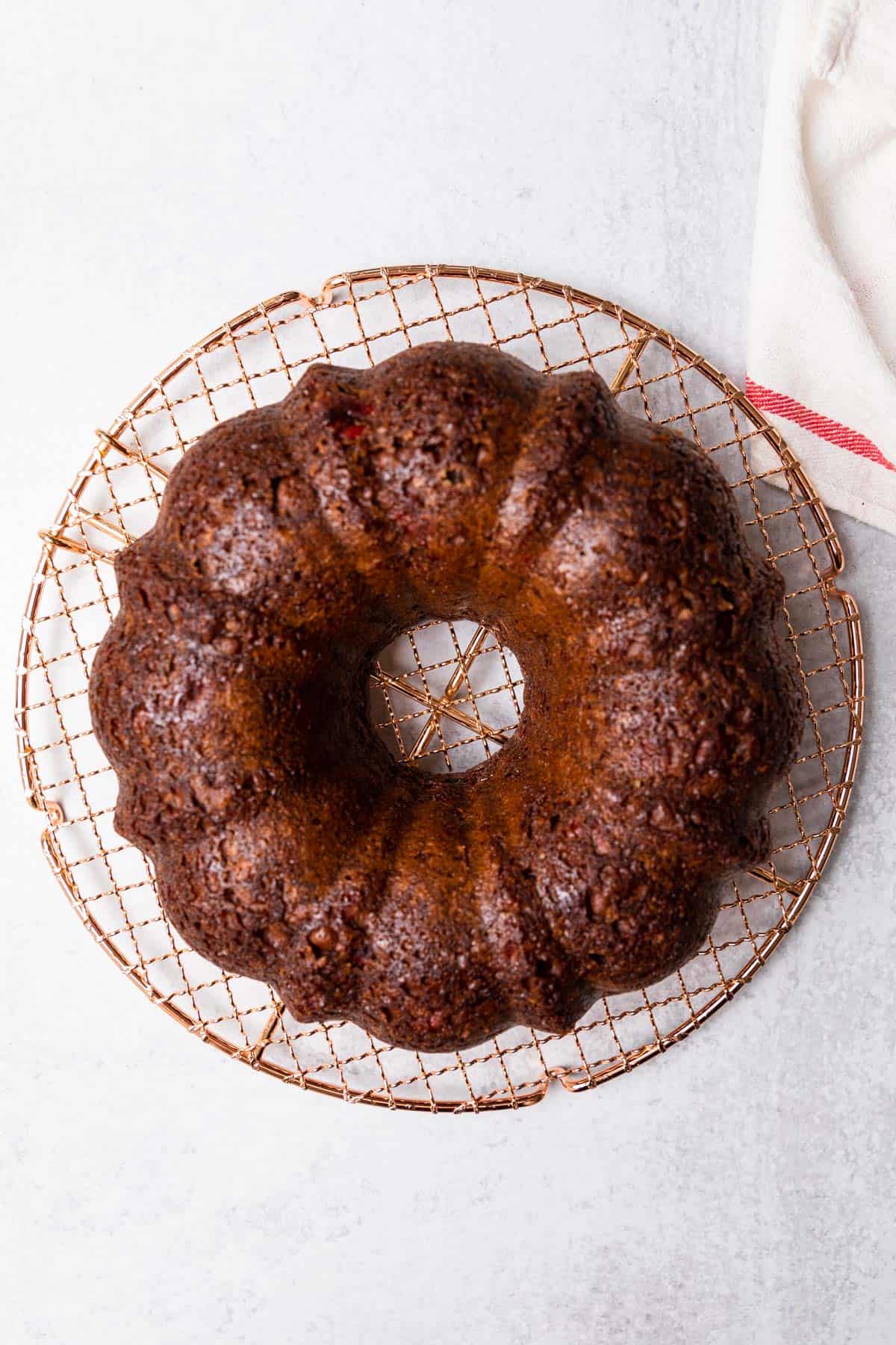 baked cake cooling a wire rack