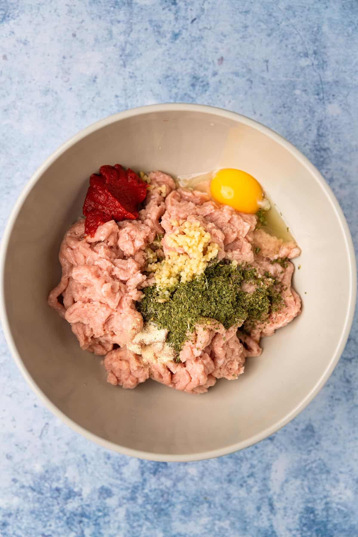 meatball mixture in a mixing bowl