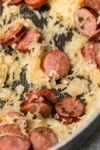 kielbasa sausage and sauerkraut mixed in a skillet