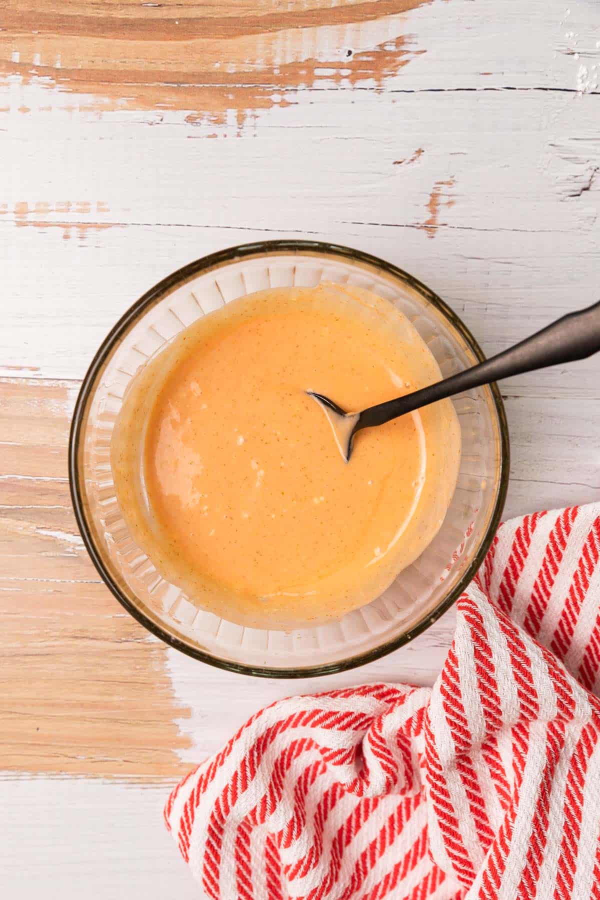 an orange sauce in a bowl