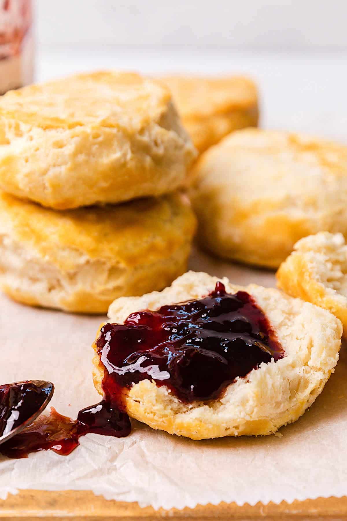 open biscuit with raspberry jam