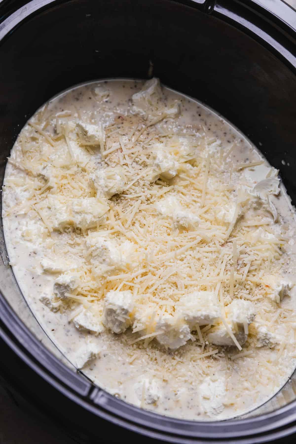 adding parmesan cheese to crockpot