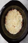 Shredded mozzarella and parmesan cheese layer in a crockpot
