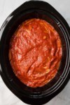 adding marinara sauce layer to a crockpot