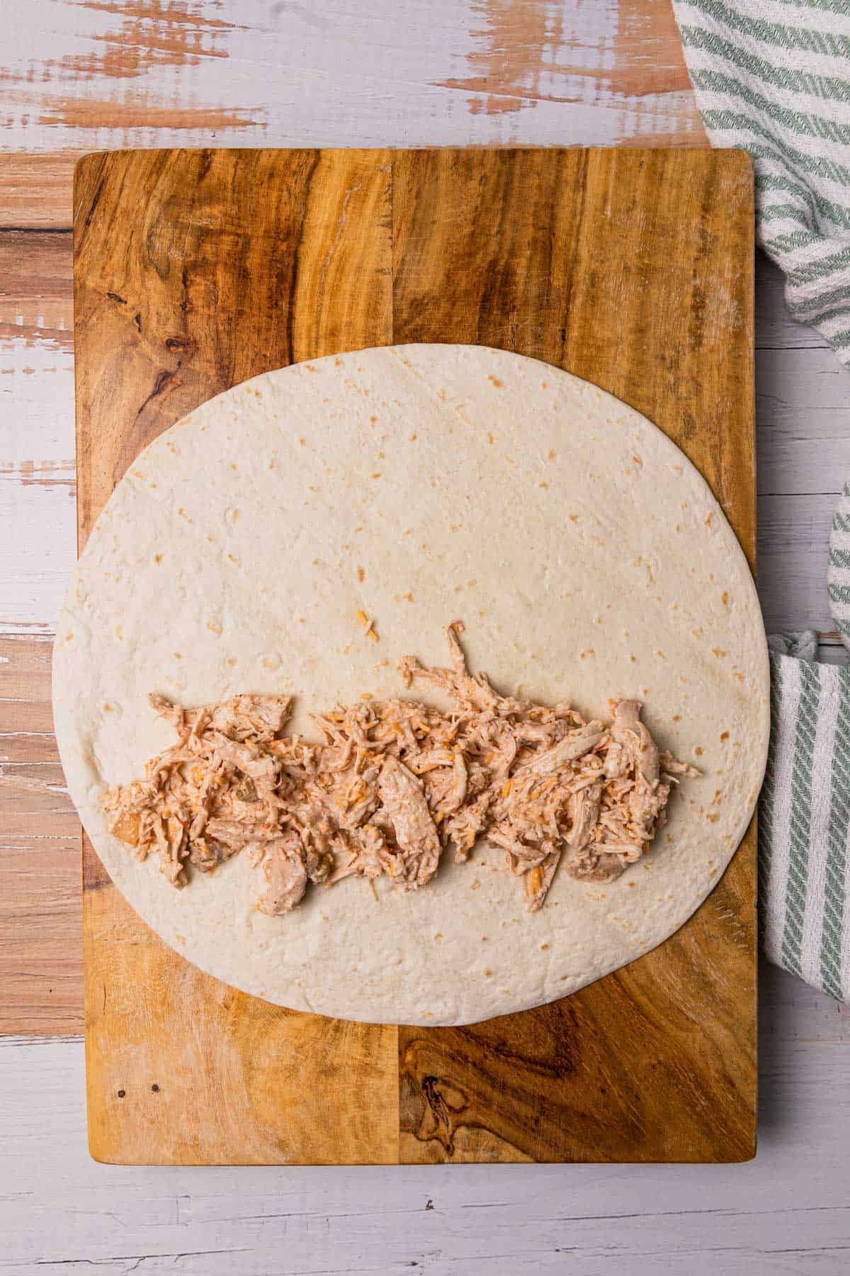 top tortilla with chicken mixture