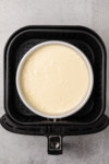 pan of batter in an air fryer basket