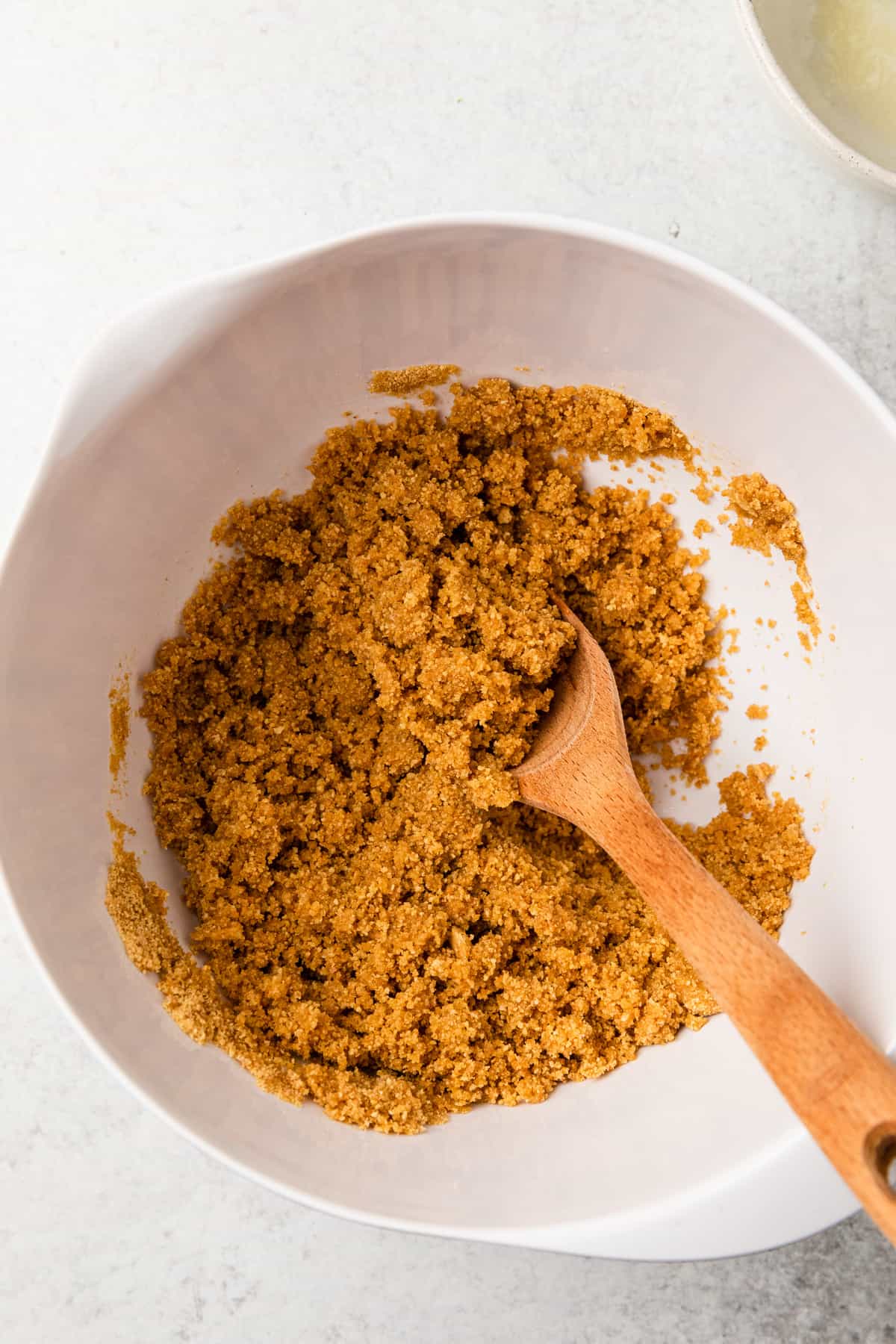 mix graham cracker crumbs with butter